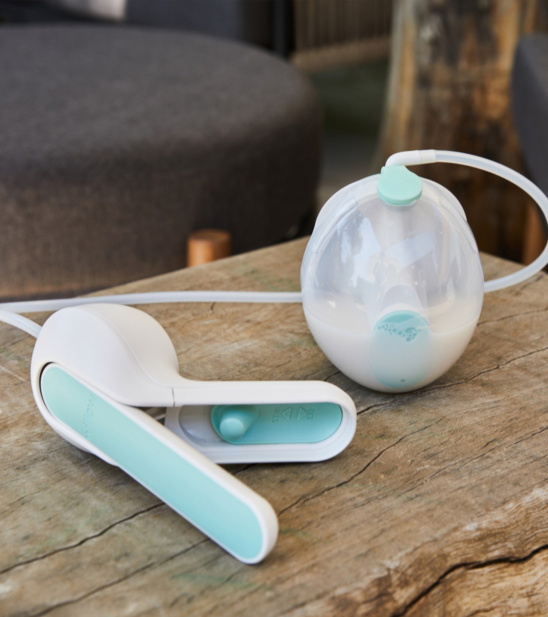 Willow Wave manual breast pump and ergonomic handle on a table